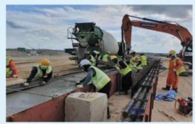 Excavator installing utilities on the Pulau Tekong site.